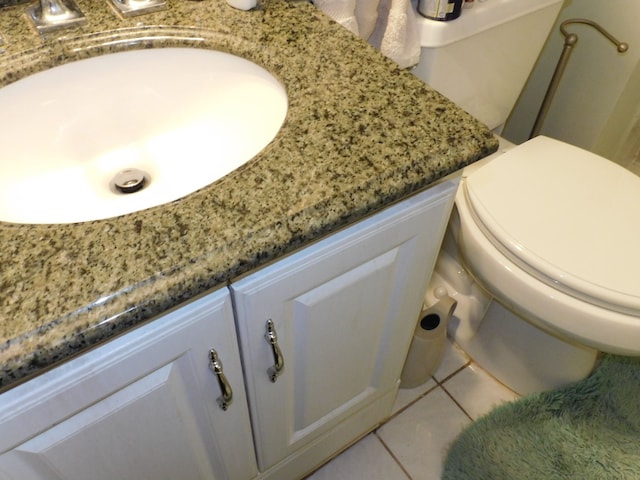 5244 Folkstone Dr, Troy, MI 48085 - bathroom with vanity, tile patterned flooring, and toilet