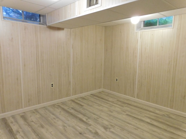 5244 Folkstone Dr, Troy, MI 48085 - basement with wooden walls, wood finished floors, and a drop ceiling