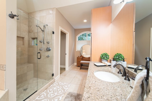 8307 Granite Ct, Dexter, MI 48130 - bathroom with a stall shower, vanity, recessed lighting, baseboards, and tile patterned flooring