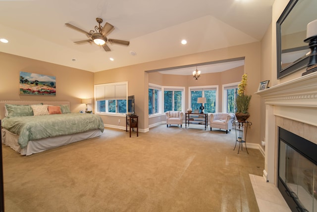 8307 Granite Ct, Dexter, MI 48130 - bedroom with carpet, baseboards, a fireplace, recessed lighting, and a chandelier
