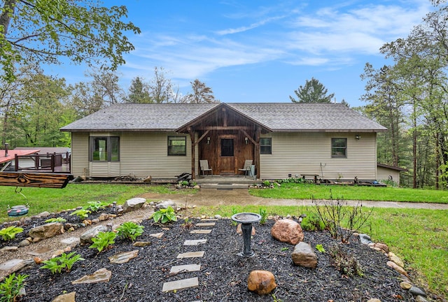 1977 E 40th St, White Cloud, MI 49349 - view of front of property featuring a front yard