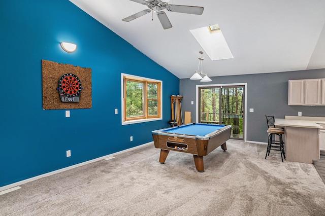 1977 E 40th St, White Cloud, MI 49349 - recreation room featuring a skylight, billiards, a ceiling fan, lofted ceiling, and light carpet