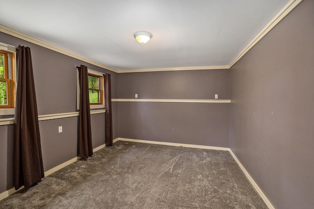1977 E 40th St, White Cloud, MI 49349 - empty room featuring crown molding, baseboards, and dark colored carpet