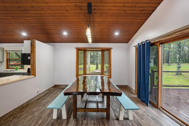 1977 E 40th St, White Cloud, MI 49349 - dining room with wood ceiling, vaulted ceiling, wood finished floors, baseboards, and recessed lighting