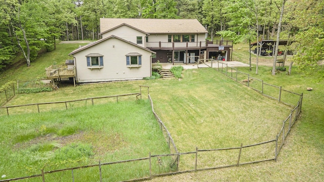 1977 E 40th St, White Cloud, MI 49349 - rear view of house featuring a deck