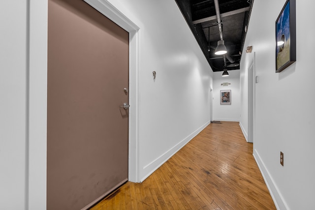 2843 E Grand Blvd Unit 9, Detroit, MI 48211 - hall with wood-type flooring and baseboards