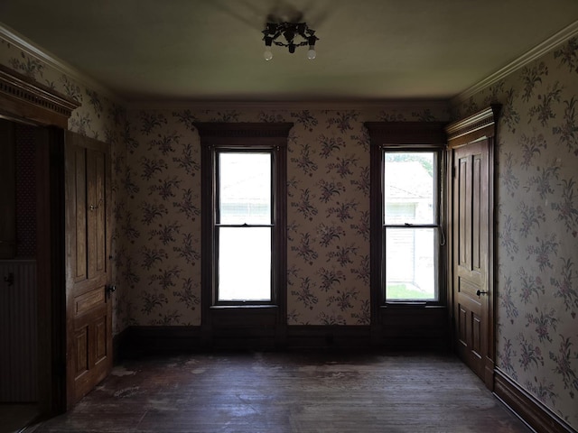 318 W King St, Owosso, MI 48867 - unfurnished room featuring dark wood-style flooring