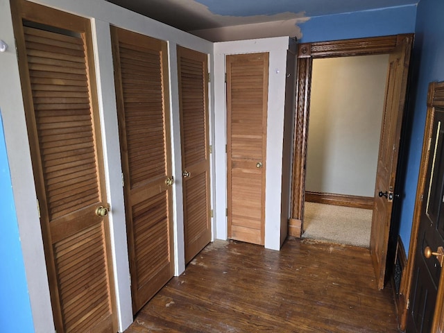 318 W King St, Owosso, MI 48867 - hall featuring dark wood finished floors