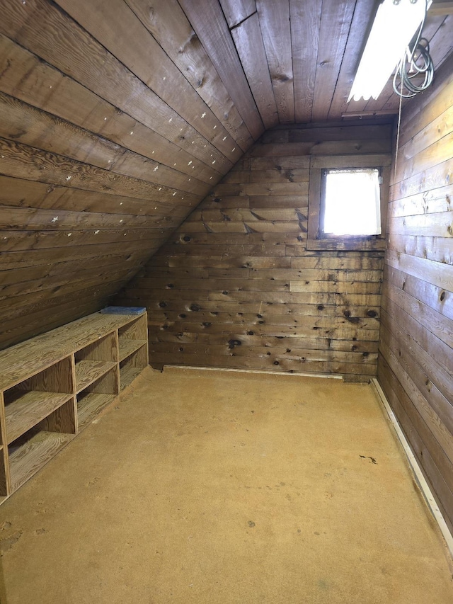 318 W King St, Owosso, MI 48867 - bonus room featuring wooden walls, wooden ceiling, lofted ceiling, and carpet