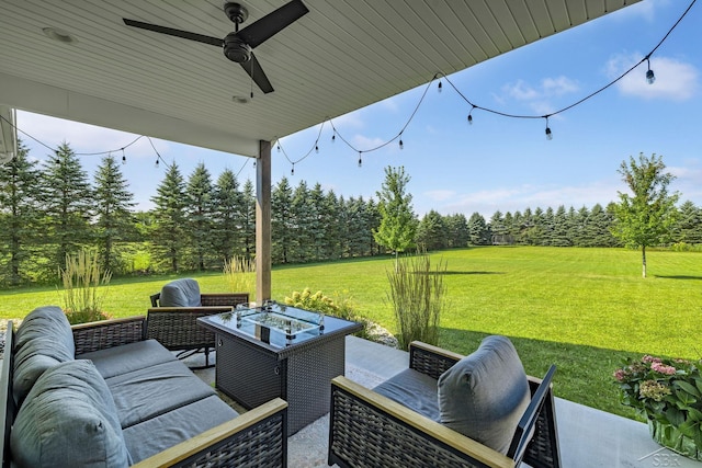 5353 N Graham Rd, Freeland, MI 48623 - view of patio / terrace with an outdoor living space with a fire pit, view of scattered trees, and ceiling fan