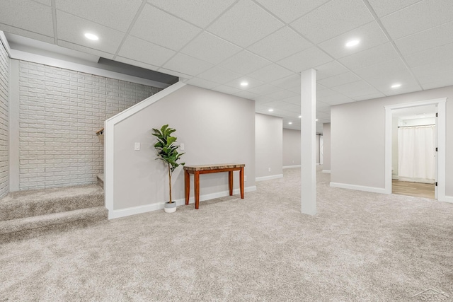5353 N Graham Rd, Freeland, MI 48623 - finished below grade area featuring brick wall, carpet flooring, recessed lighting, baseboards, and stairway