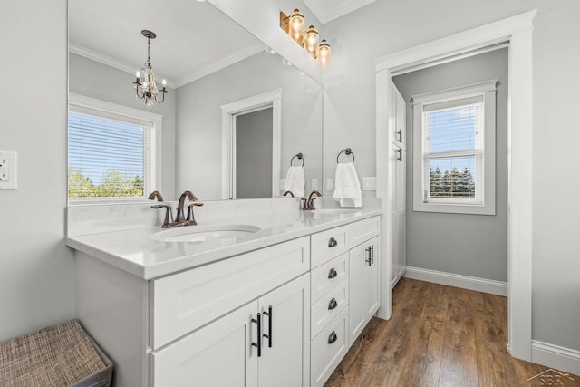 5353 N Graham Rd, Freeland, MI 48623 - full bathroom featuring plenty of natural light, wood finished floors, baseboards, ornamental molding, and a chandelier