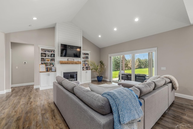 5353 N Graham Rd, Freeland, MI 48623 - living room featuring a large fireplace, baseboards, wood finished floors, recessed lighting, and high vaulted ceiling