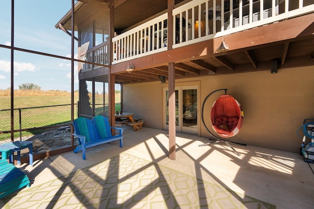view of patio / terrace with a balcony
