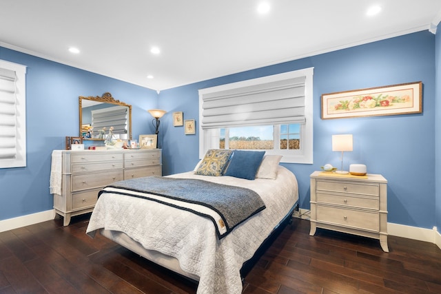 bedroom featuring hardwood / wood-style floors, baseboards, recessed lighting, and ornamental molding