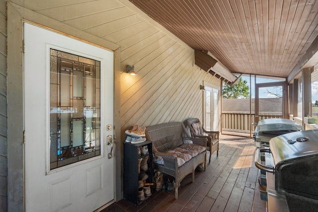 sunroom with lofted ceiling