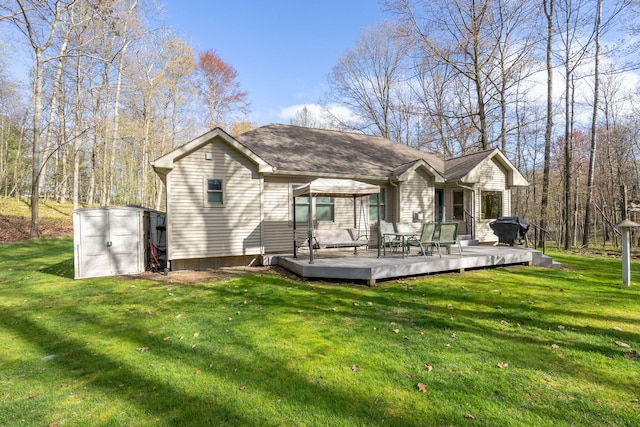 9100 Boggie Dr Unit 159, Canadian Lakes, MI 49346 - back of house featuring a shed, an outbuilding, a yard, a wooden deck, and roof with shingles