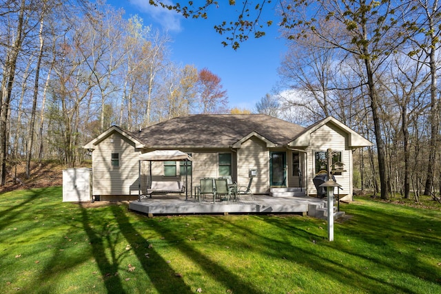 9100 Boggie Dr Unit 159, Canadian Lakes, MI 49346 - back of house with a yard and a wooden deck