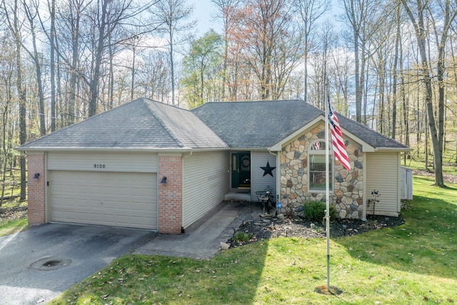 9100 Boggie Dr Unit 159, Canadian Lakes, MI 49346 - ranch-style house featuring an attached garage, driveway, a front lawn, a shingled roof, and stone siding