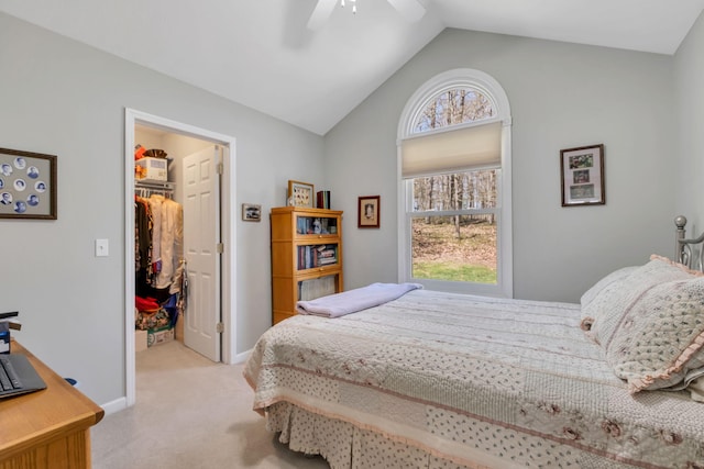 9100 Boggie Dr Unit 159, Canadian Lakes, MI 49346 - bedroom featuring light carpet, a walk in closet, multiple windows, lofted ceiling, and a closet