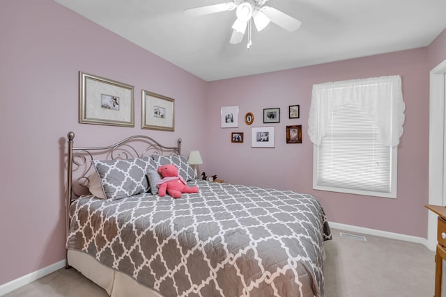 9100 Boggie Dr Unit 159, Canadian Lakes, MI 49346 - carpeted bedroom with baseboards and a ceiling fan