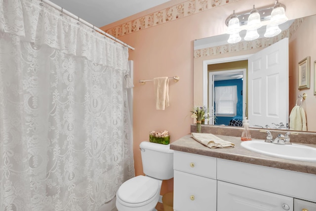9100 Boggie Dr Unit 159, Canadian Lakes, MI 49346 - full bath featuring toilet, vanity, and a shower with shower curtain