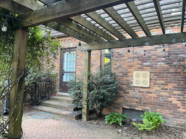 532 Saint Clair St, Grosse Pointe, MI 48230 - property entrance featuring brick siding and a pergola