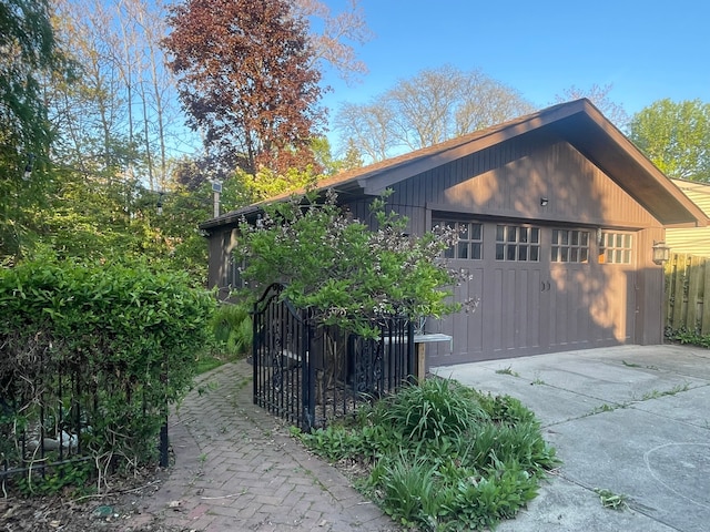 532 Saint Clair St, Grosse Pointe, MI 48230 - view of side of home with fence and concrete driveway