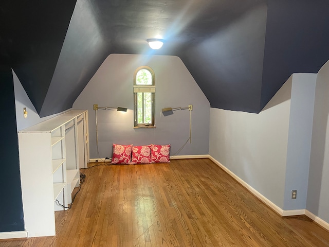 532 Saint Clair St, Grosse Pointe, MI 48230 - bonus room featuring wood finished floors, vaulted ceiling, and baseboards