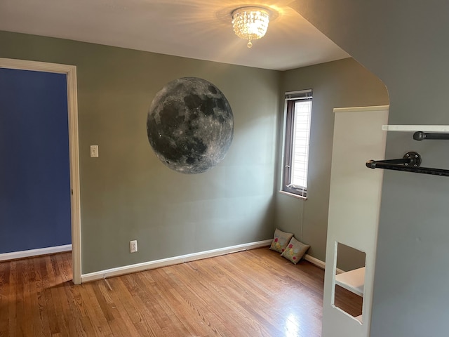 532 Saint Clair St, Grosse Pointe, MI 48230 - unfurnished room featuring wood finished floors and baseboards