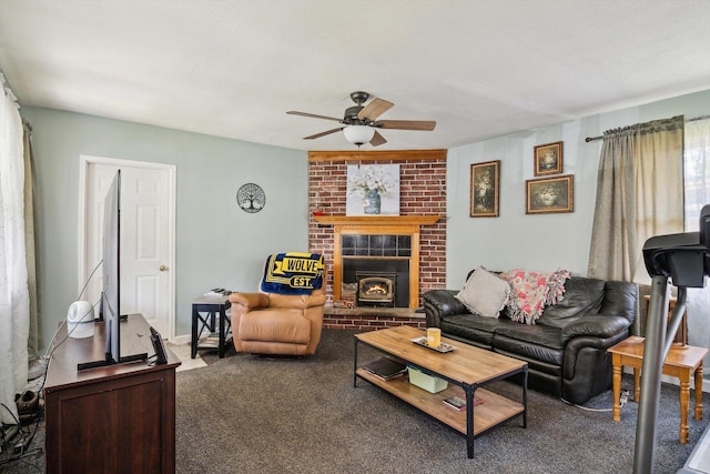 carpeted living area with a ceiling fan and a brick fireplace