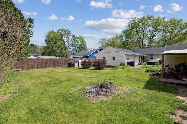 view of yard featuring an attached garage