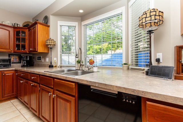 8216 Leonard Dr, Holly, MI 48442 - kitchen featuring dishwasher, a sink, light tile patterned flooring, glass insert cabinets, and light countertops