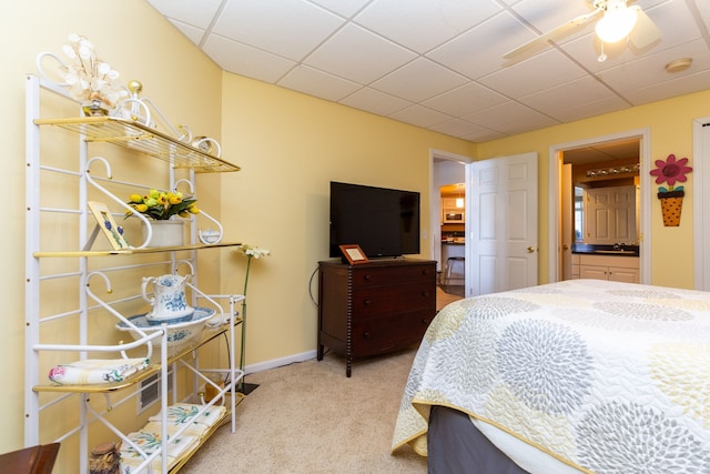 8216 Leonard Dr, Holly, MI 48442 - bedroom with carpet floors, a drop ceiling, baseboards, and a sink