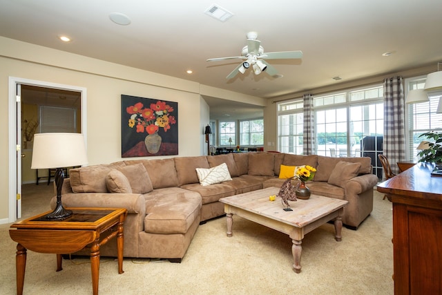 8216 Leonard Dr, Holly, MI 48442 - living room featuring a ceiling fan, light carpet, and recessed lighting