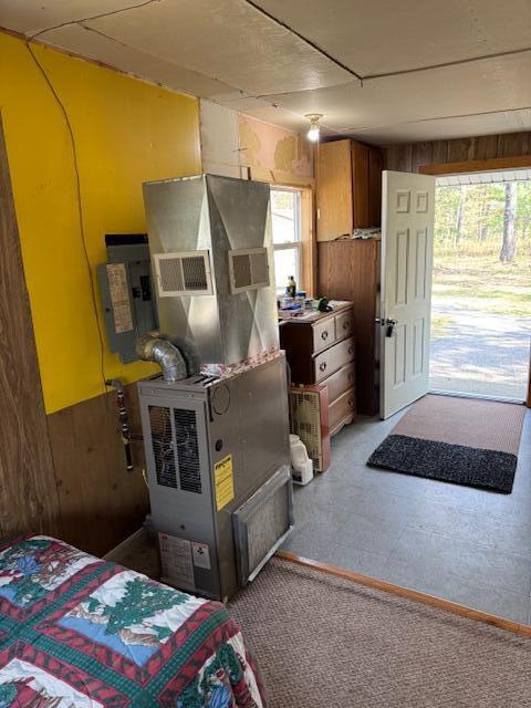 8038 W Hemlock Ave, Baldwin, MI 49304 - interior space featuring wooden walls