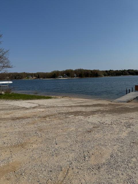 8038 W Hemlock Ave, Baldwin, MI 49304 - water view featuring a dock