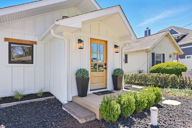 doorway to property with board and batten siding