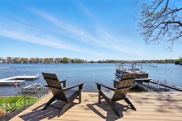 dock featuring a water view and boat lift