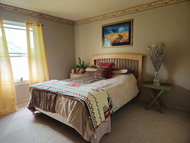 24864 Christina Dr, Flat Rock, MI 48134 - bedroom with multiple windows, carpet flooring, and baseboards