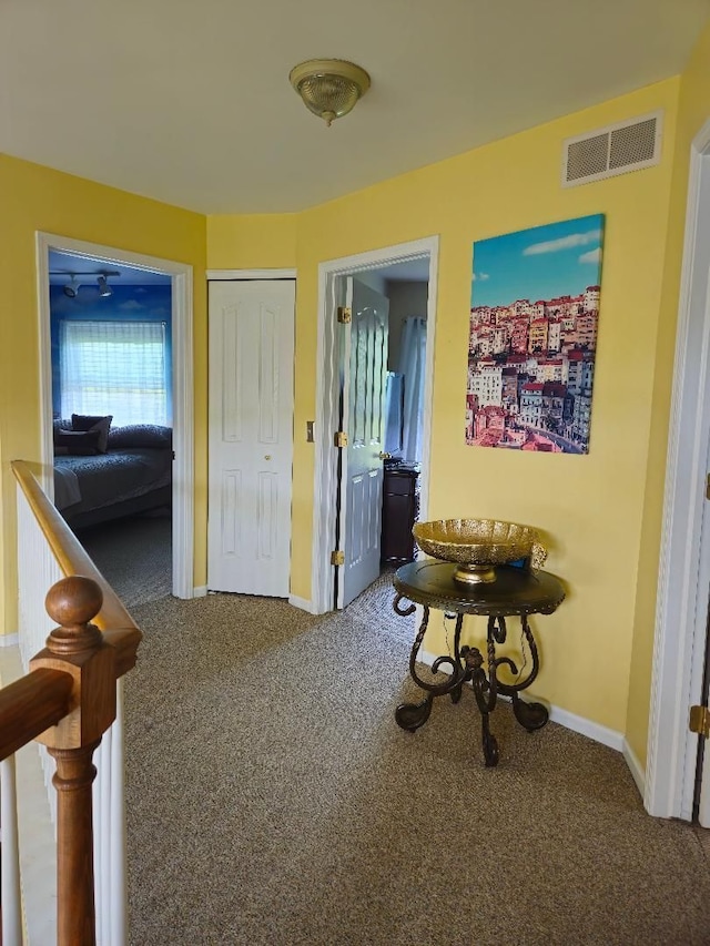 24864 Christina Dr, Flat Rock, MI 48134 - corridor featuring baseboards and carpet flooring