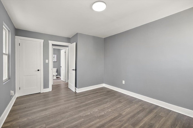 13519 Mansfield St, Detroit, MI 48227 - unfurnished room featuring baseboards and dark wood-style floors