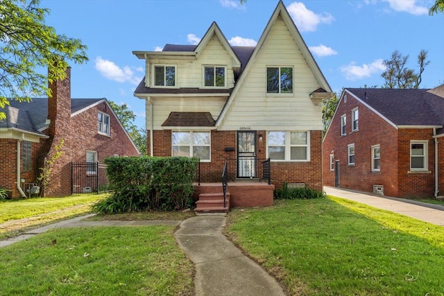 13519 Mansfield St, Detroit, MI 48227 - tudor-style house featuring brick siding