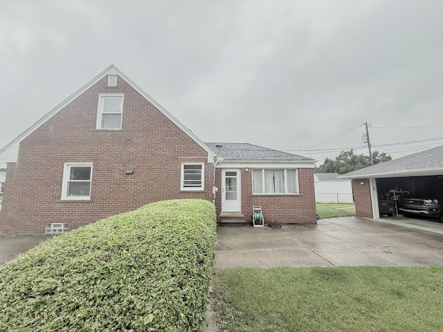 view of front of property featuring brick siding