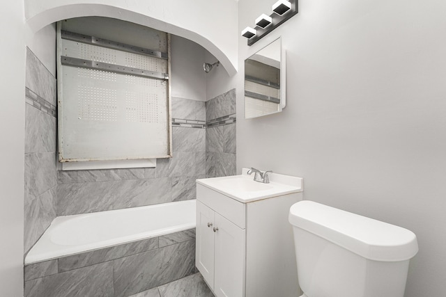 20410 Hull St, Highland Park, MI 48203 - bathroom with toilet, vanity, and tiled shower / bath combo