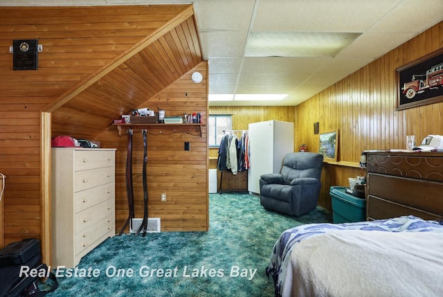 2505 Blake St, Saginaw, MI 48602 - carpeted bedroom with wooden walls and lofted ceiling