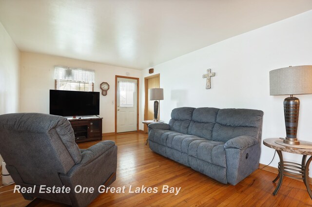2505 Blake St, Saginaw, MI 48602 - living area with wood finished floors and baseboards
