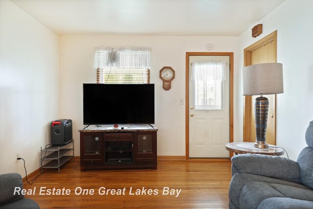 2505 Blake St, Saginaw, MI 48602 - living room featuring wood finished floors and baseboards