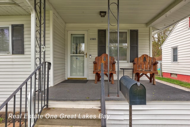 2505 Blake St, Saginaw, MI 48602 - view of exterior entry featuring covered porch