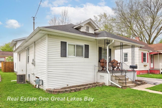 2505 Blake St, Saginaw, MI 48602 - bungalow featuring central air condition unit and covered porch